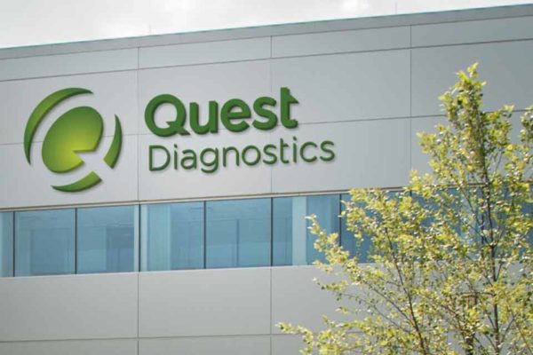 New Quest Diagnostics logo on building exterior
